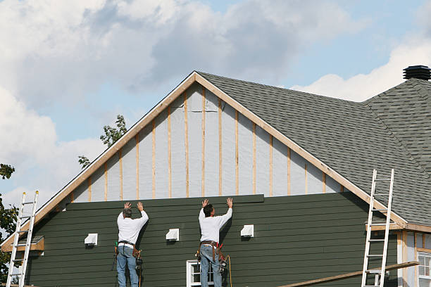 Professional Siding Contractor technician working in Keller, TX